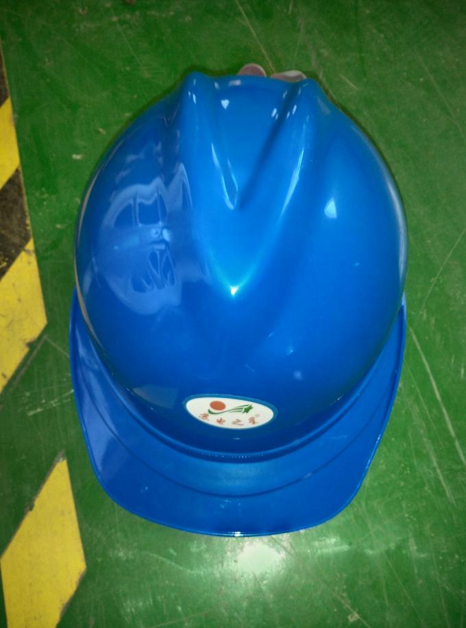A segurança pessoal do capacete de segurança utiliza ferramentas o chapéu de segurança das capas protetoras para as orelhas para a construção do poder
