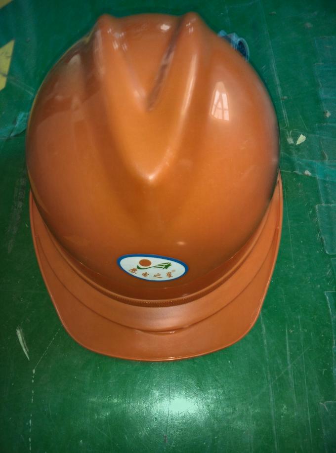 A segurança pessoal do capacete de segurança utiliza ferramentas o chapéu de segurança das capas protetoras para as orelhas para a construção do poder