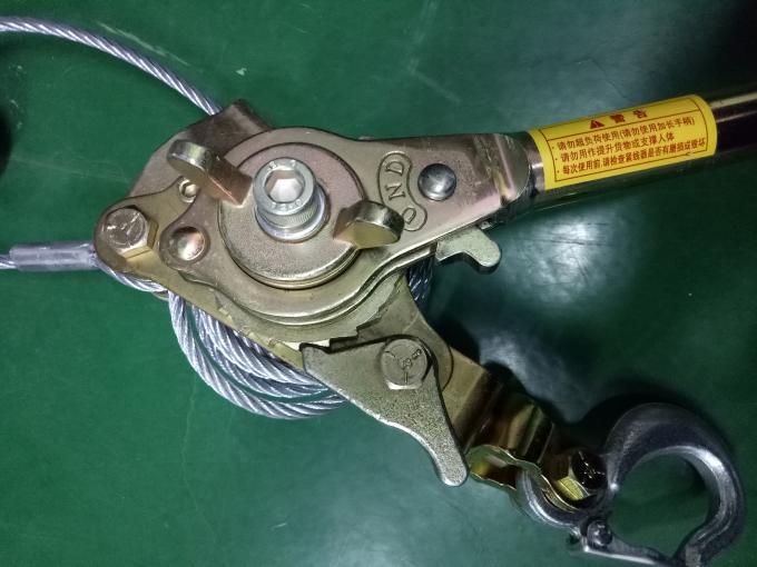 Retirando a certificação mais apertada manual do ISO da corda de fio da catraca do extrator do cabo da mão